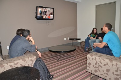 students watching tv in lounge.jpg